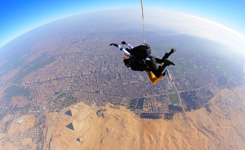 VIDEO: 60 International Skydivers Jump Over Pyramids 