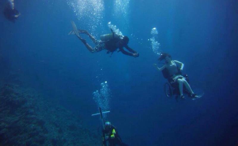 The Story Behind the Viral Underwater Wheelchair Photo in Sharm El Sheikh