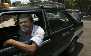 Morsi Drives a Cab