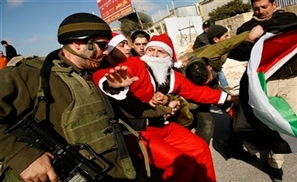IDF Fire Tear Gas at Palestinian Santas